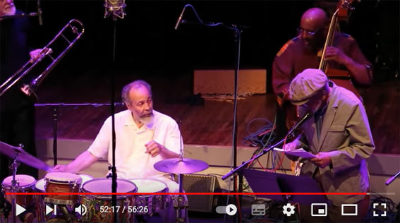 New York HeArt Ensemble, Vision Festival 18, Roulette, Brooklyn, 12 juin 2013: Milford Graves (dm, perc), William Parker (b), Amiri Baraka (rec), et hors cadre: Charles Gayle (ts, p), Roswell Rudd (tb) New York HeArt Ensemble, Vision Festival 18, Roulette, Brooklyn, 12 juin 2013: Milford Graves (dm, perc), William Parker (b), Amiri Baraka (rec), et hors cadre: Charles Gayle (ts, p), Roswell Rudd (tb)